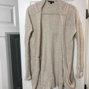 Cream cardigan with pockets and hood